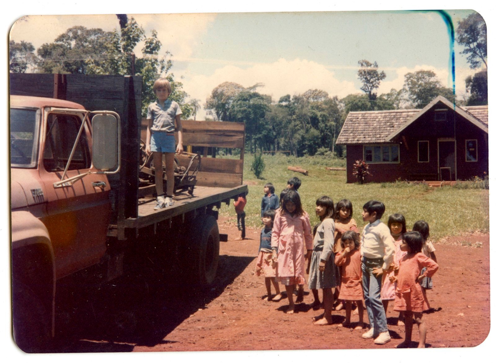 Horacio Tarnowski, the second generation of Polish migrants and a group of children from the Guarani tribe, Misiones, Argentina. Photo taken by grandfather Horacio, Pedro Tarnowski.